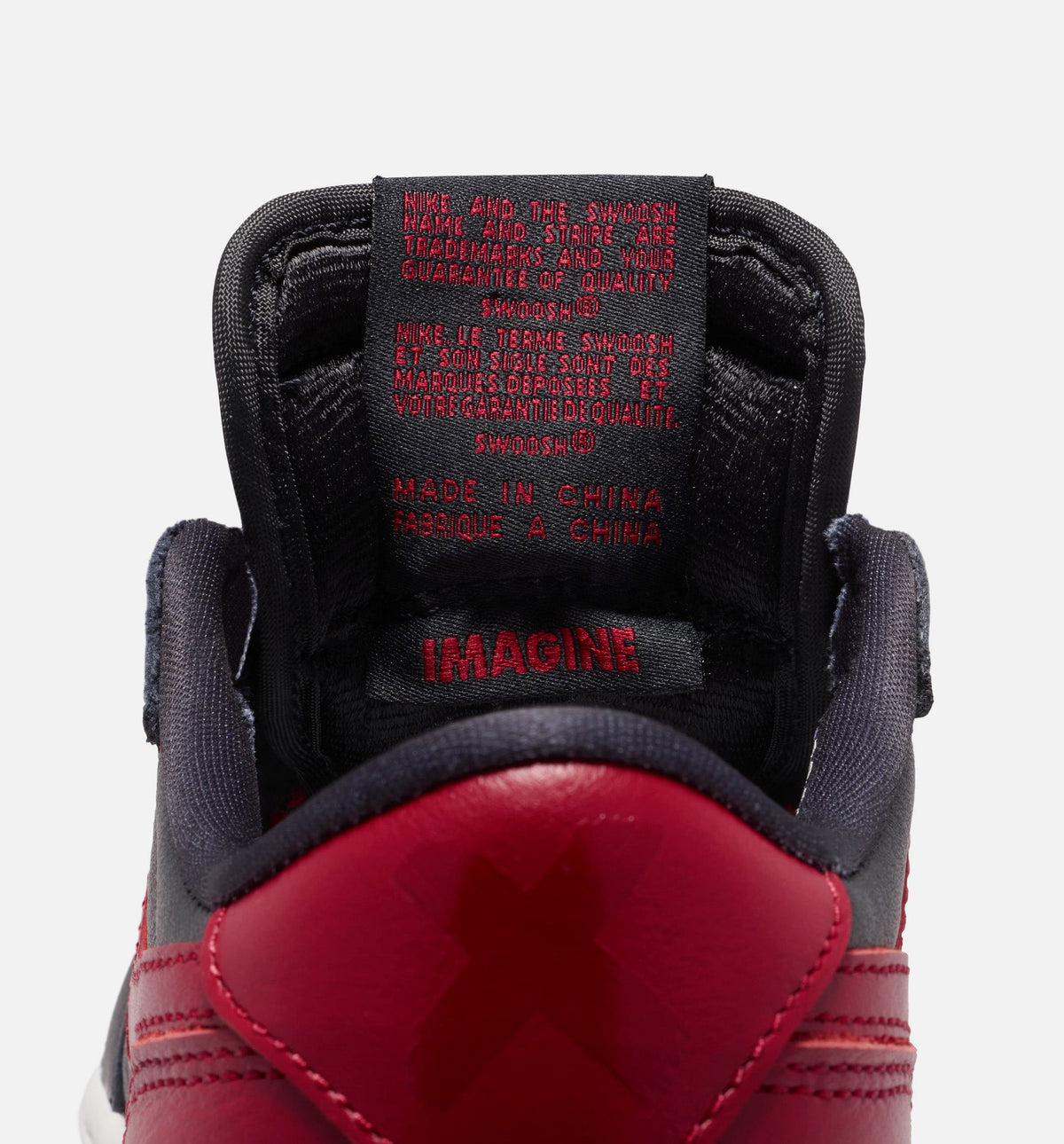 Air Jordan 1 Retro Low OG Banned – Grade School Lifestyle Sneaker (Black / Varsity Red)