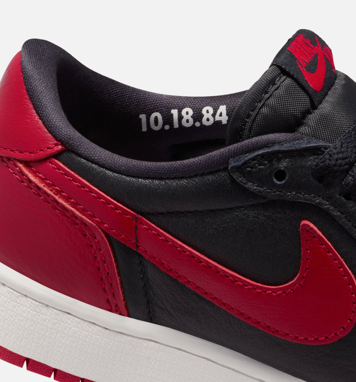 Air Jordan 1 Retro Low OG Banned – Grade School Lifestyle Sneaker (Black / Varsity Red)