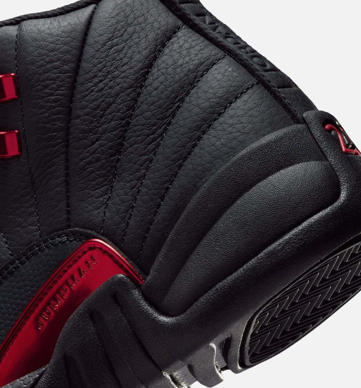 Air Jordan 12 Retro Bloodline – Grade School Lifestyle Sneaker (Black / Varsity Red)