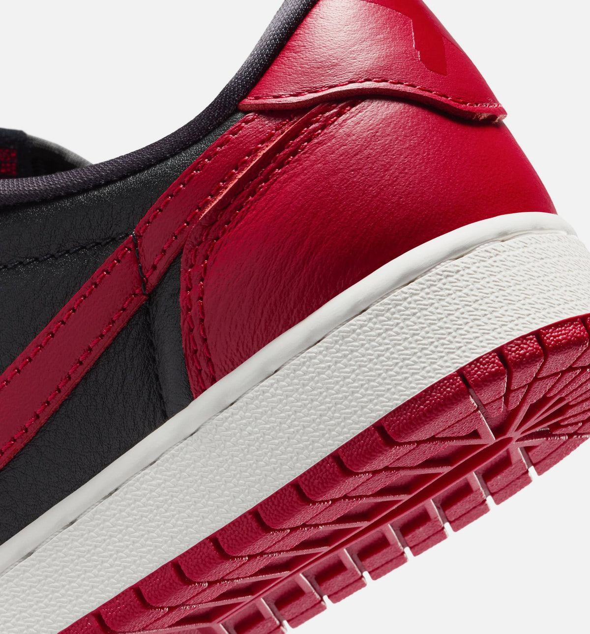 Air Jordan 1 Retro Low OG Banned – Grade School Lifestyle Sneaker (Black / Varsity Red)