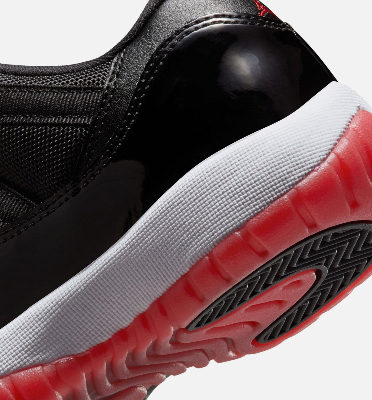 Air Jordan 11 Retro Bred – Grade School Lifestyle Sneaker (Black / Varsity Red / White)